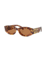 Miu Miu lunettes de soleil à monture papillon